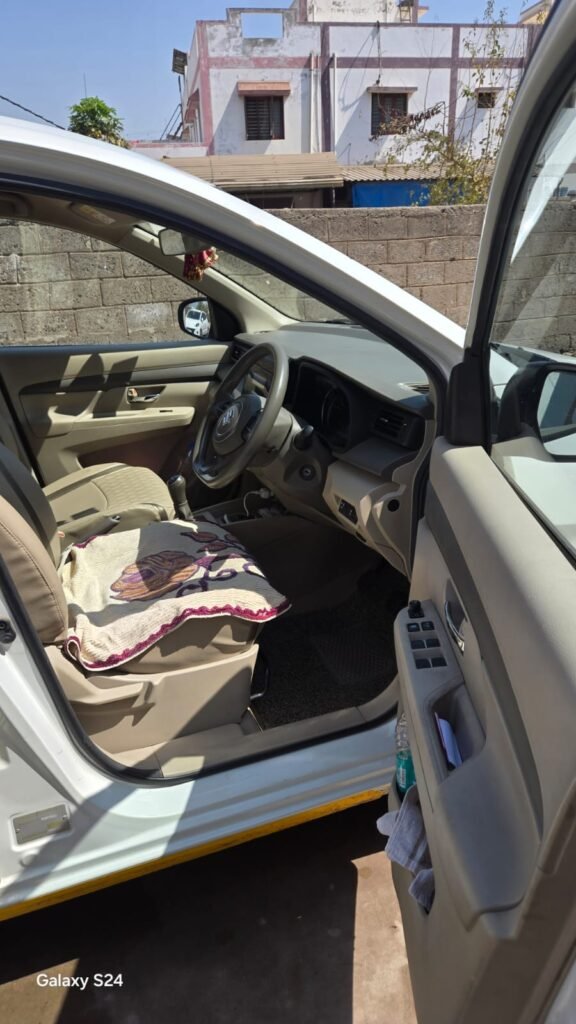 Driver side view of the well-maintained rental car