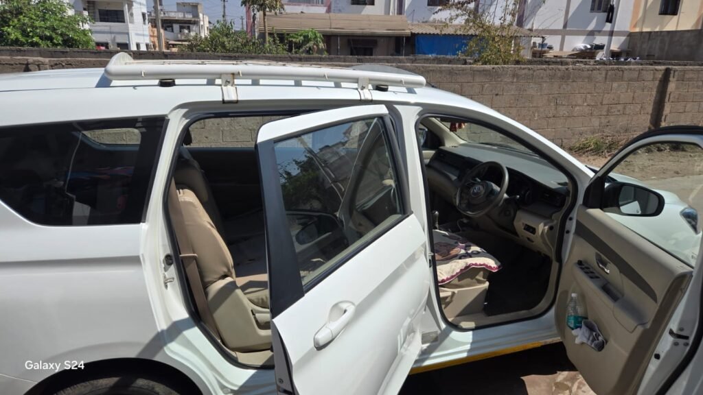 Side view of the tourist car with open doors