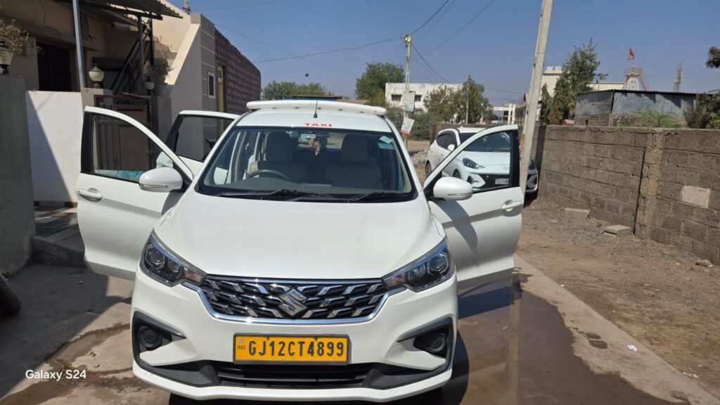 Rental car with doors open, ready for passengers